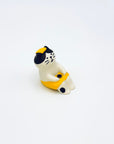 Side view of the resin-crafted Cat & Towel Incense Stick Holder, showing the cat’s yellow towel and small black spot on the leg.