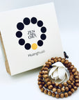 ZA Studio Huanghuali Bead Bracelet (small) displayed with its signature box, showcasing natural grain patterns and warm golden-brown hues.