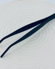 Close-up of the Zen Grip Tweezers, featuring precision angled stainless-steel tips with a matte black finish.