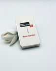 Zen Aroma Rose Garden To-Go Incense Kit in beige metal box, styled with a white flower on a clean white background, showcasing minimalist packaging design.