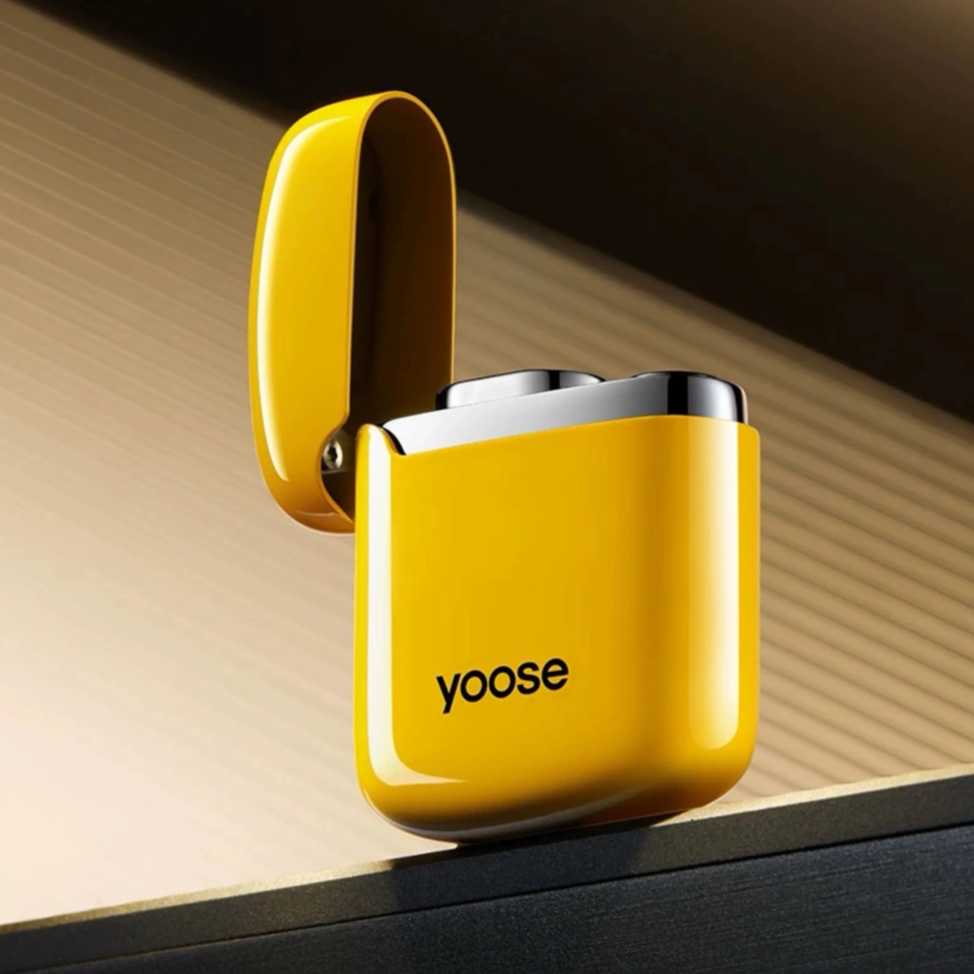 Bright yellow Yoose arc lighter with open lid, showcasing compact and glossy design — windproof, rechargeable, and curated by Zen Aroma.