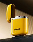 Bright yellow Yoose arc lighter with open lid, showcasing compact and glossy design — windproof, rechargeable, and curated by Zen Aroma.