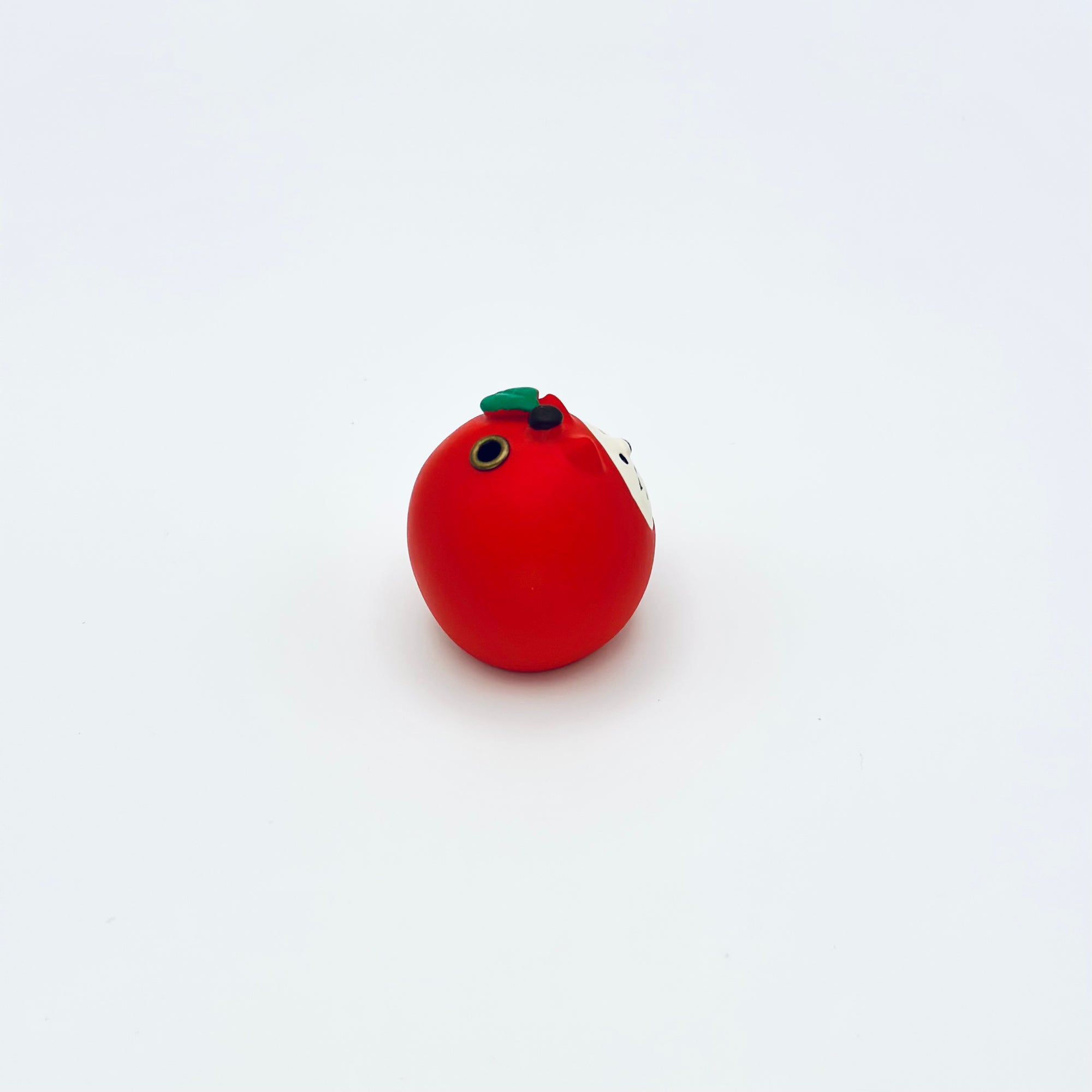 Back view of the resin-crafted Cat & Apple Incense Stick Holder, showing the incense hole at the top of the apple.