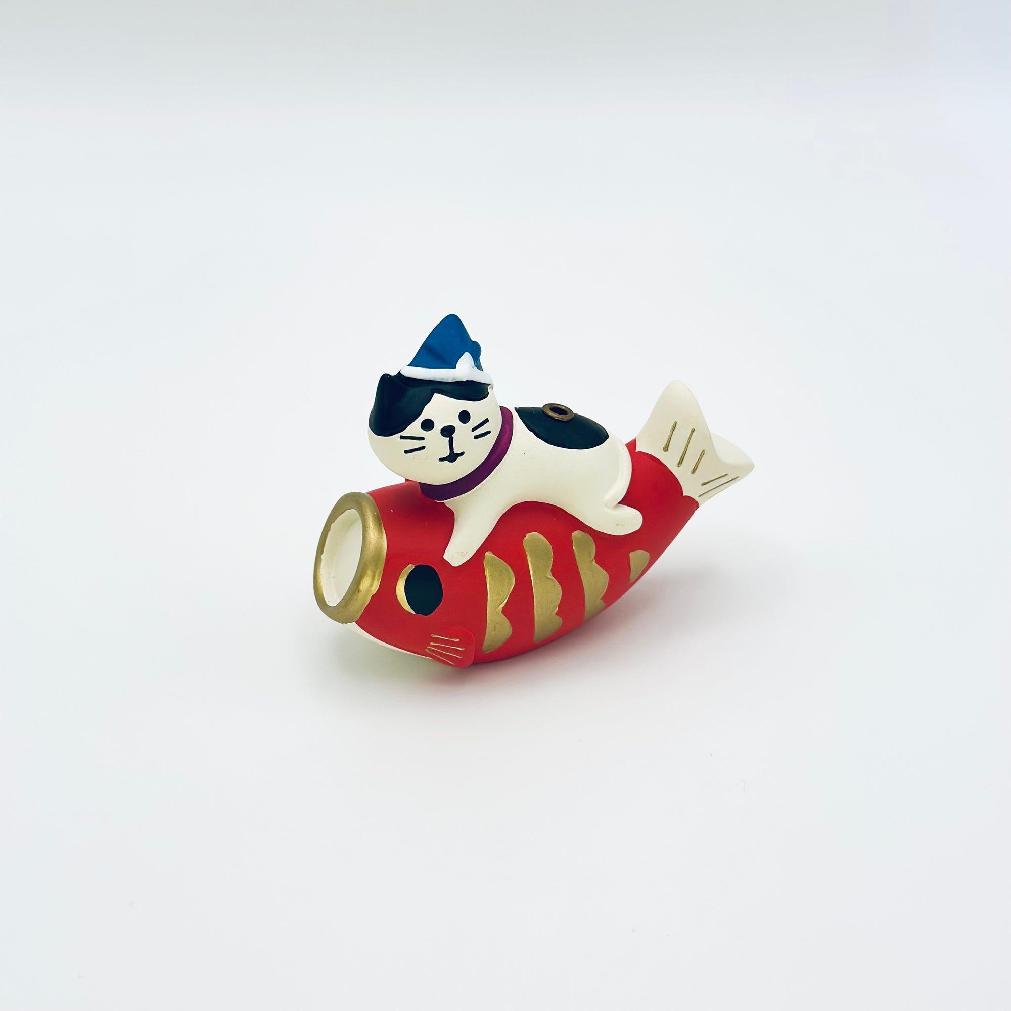 Cat and koi incense stick holder in a clean front view, showing the sitting cat on a red koi fish.