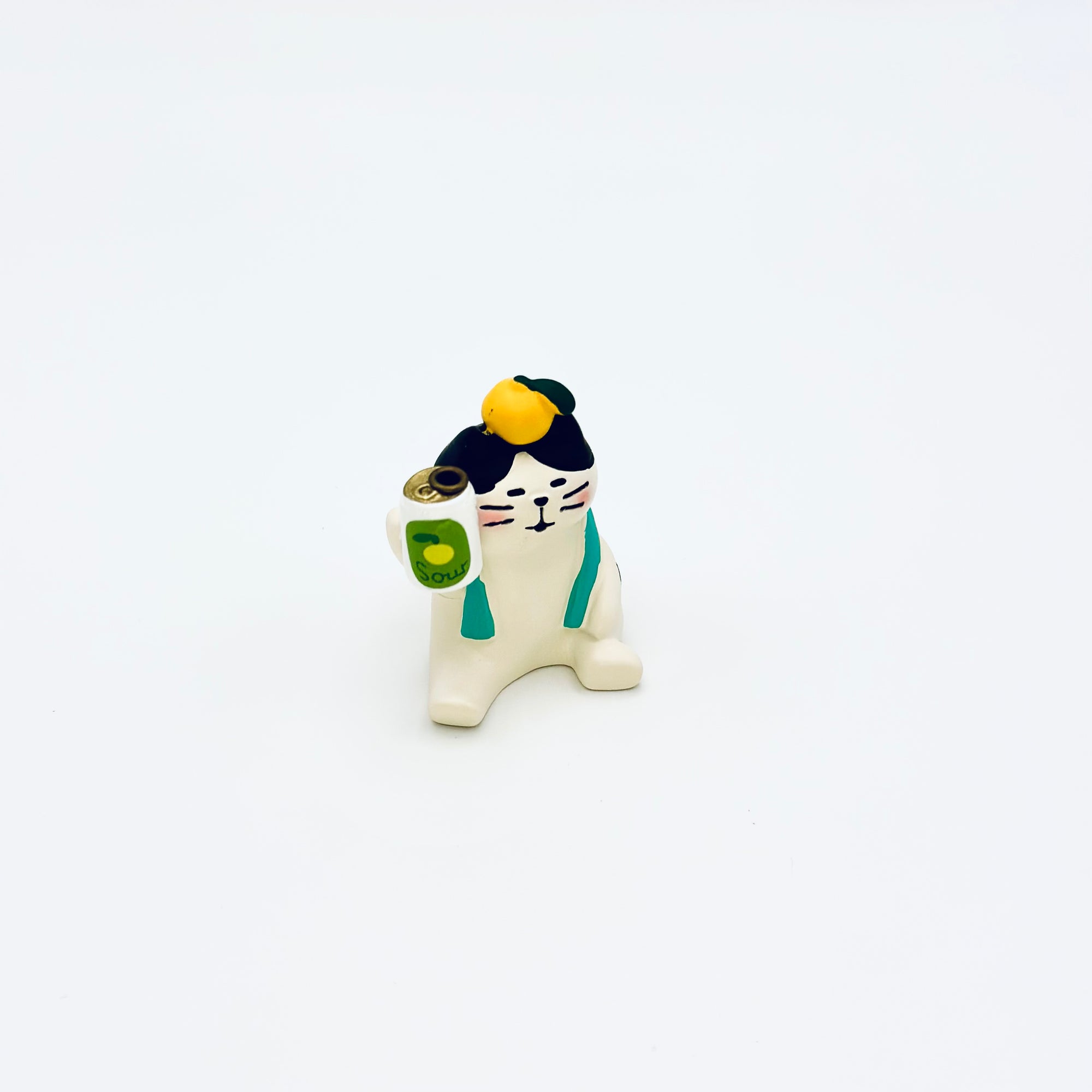 A resin-crafted Cat & Soda Incense Stick Holder featuring a relaxed white cat with a soda can and a lemon on its head, displayed against a clean white background.