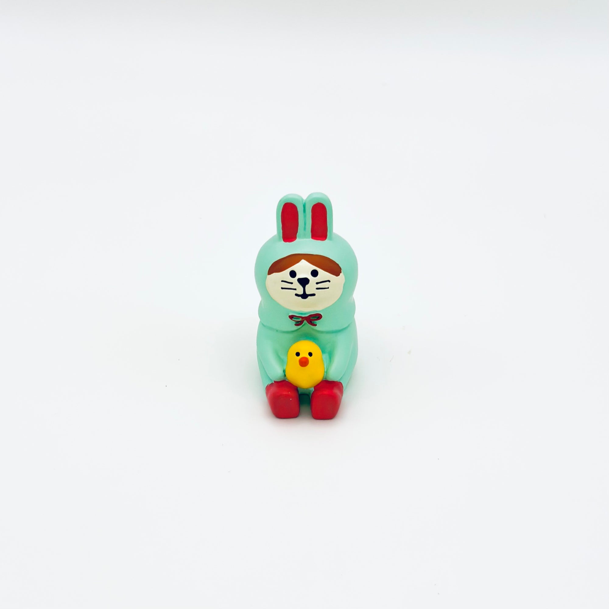 A front view of the bunny-and-chick resin incense holder, featuring hand-painted details and a cute, gentle expression.