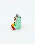 A mint-green bunny resin incense holder holding a small yellow chick, shown from a side angle on a clean white background.
