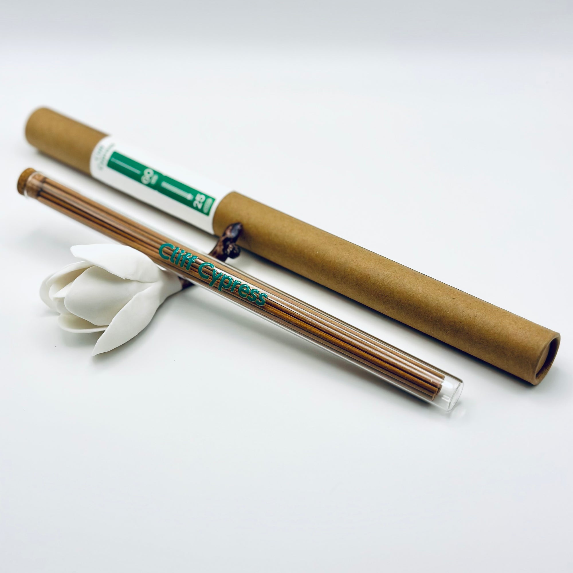 Zen Aroma Cliff Cypress incense sticks in a glass tube with cork and brown cardboard tube packaging, displayed on a clean white background.