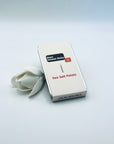 Zen Aroma Sea Salt Petals To-Go Incense Kit in beige metal box, styled with a white flower on a clean white background, showcasing minimalist packaging design.