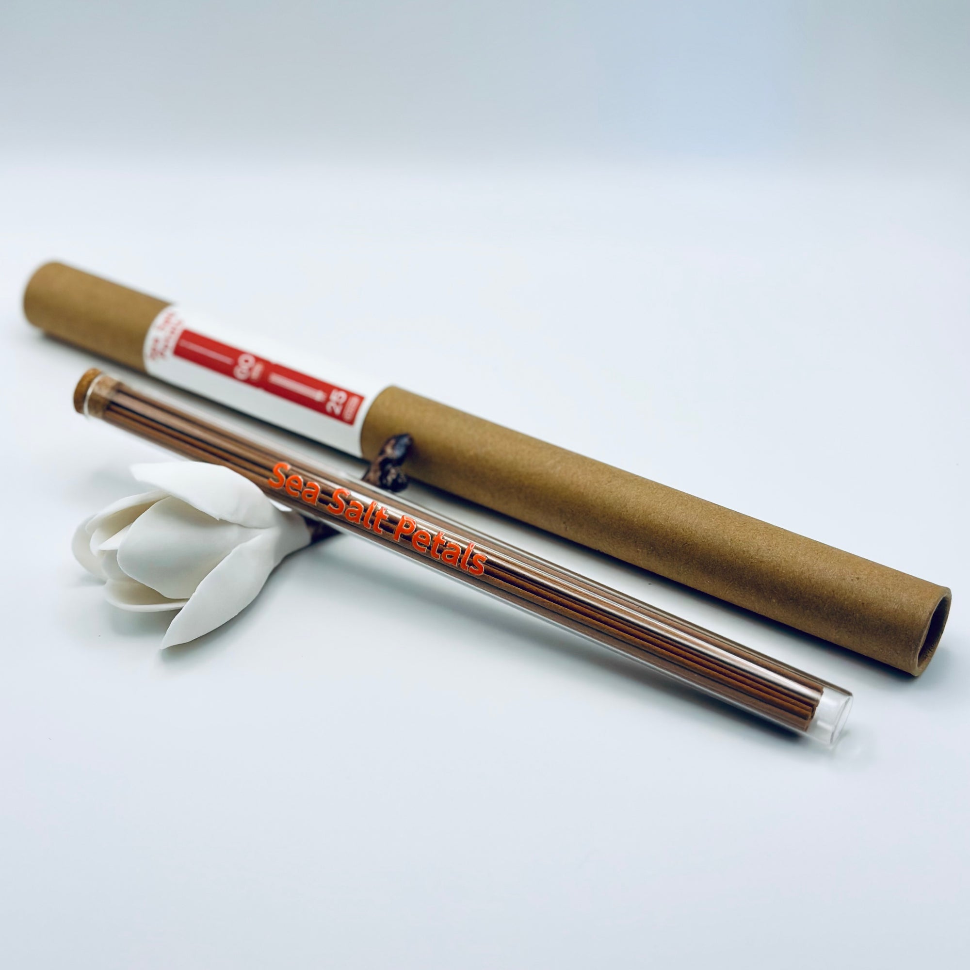 Zen Aroma Sea Salt Petals incense sticks in a glass tube with cork and brown cardboard tube packaging, displayed on a clean white background.