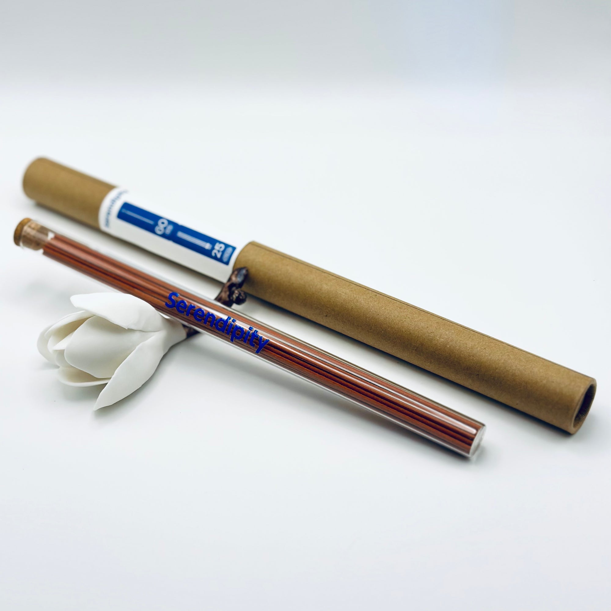 Zen Aroma Serendipity incense sticks in a glass tube with cork and brown cardboard tube packaging, displayed on a clean white background.