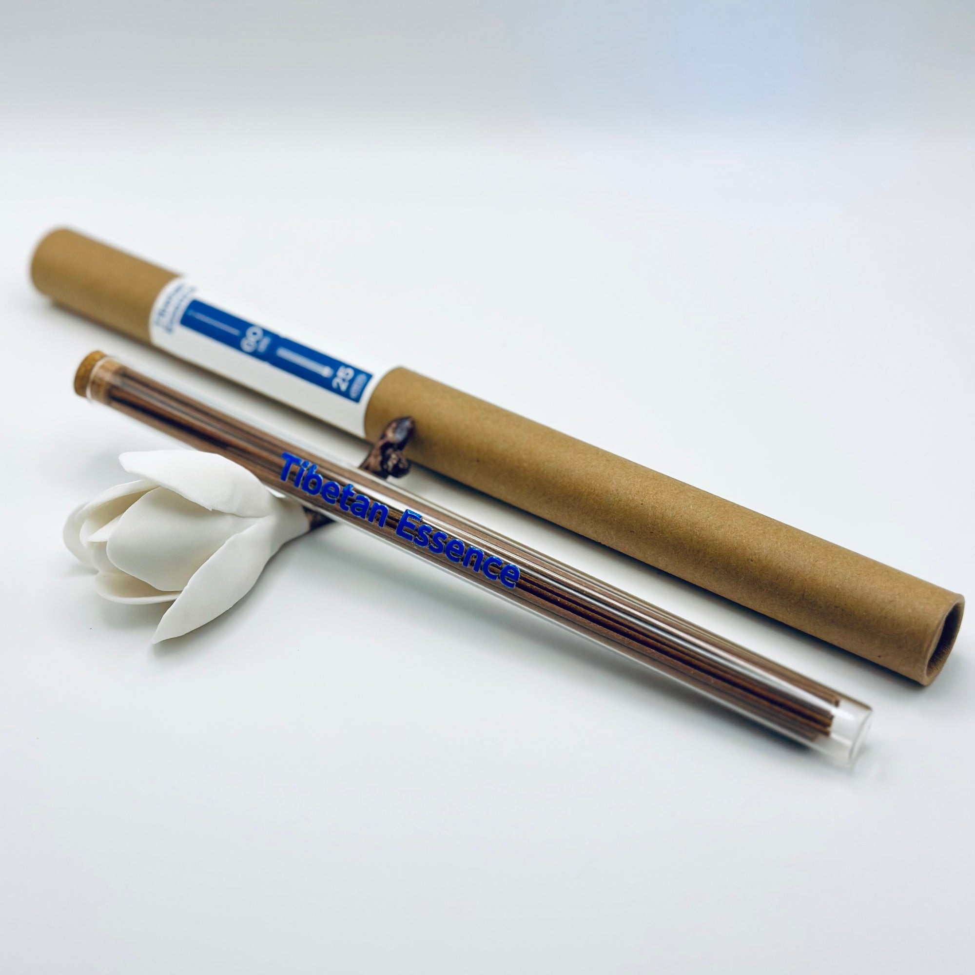 Zen Aroma Tibetan Essence incense sticks in a glass tube with cork and brown cardboard tube packaging, displayed on a clean white background.