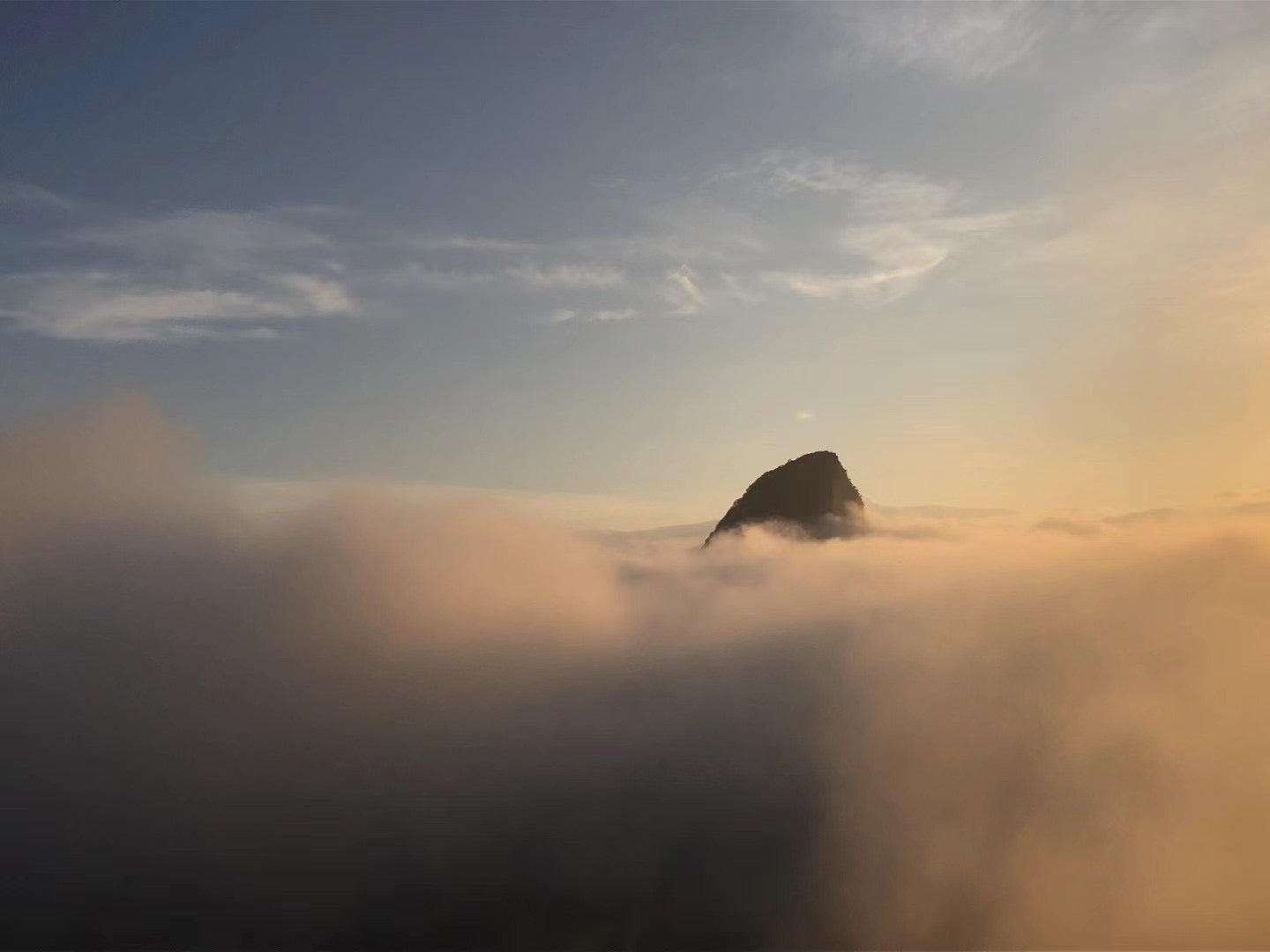 Zen Aroma incense inspired by nature – mountain peak above morning mist, symbolizing fragrances rooted in flowers, resins, and earth