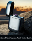 Zen Aroma plasma arc lighter by Yoose, shown on a rocky surface at sunset—weatherproof, windproof, and ideal for outdoor incense rituals.